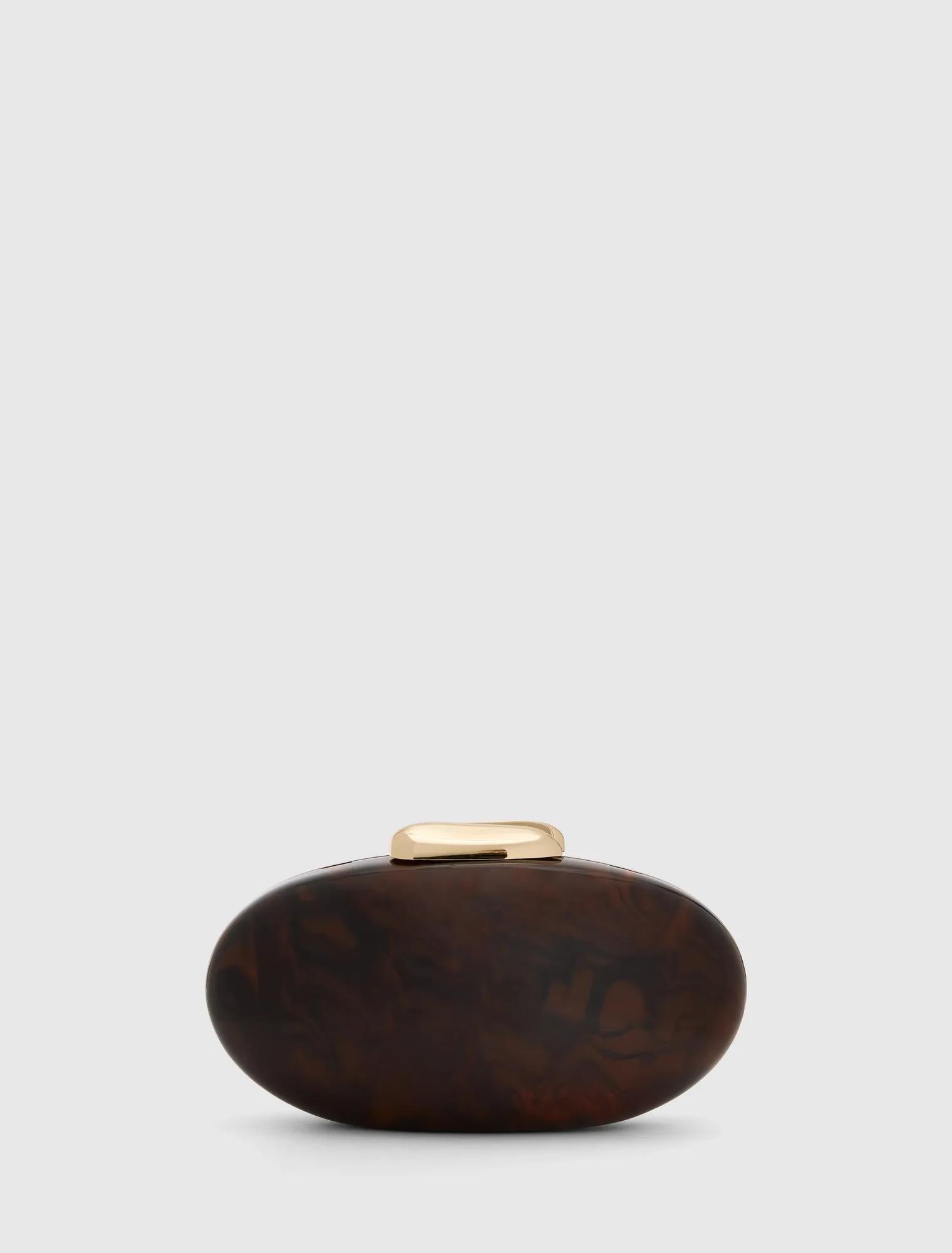 Peyton Oval Hardcase Clutch Tortoise_mannequin