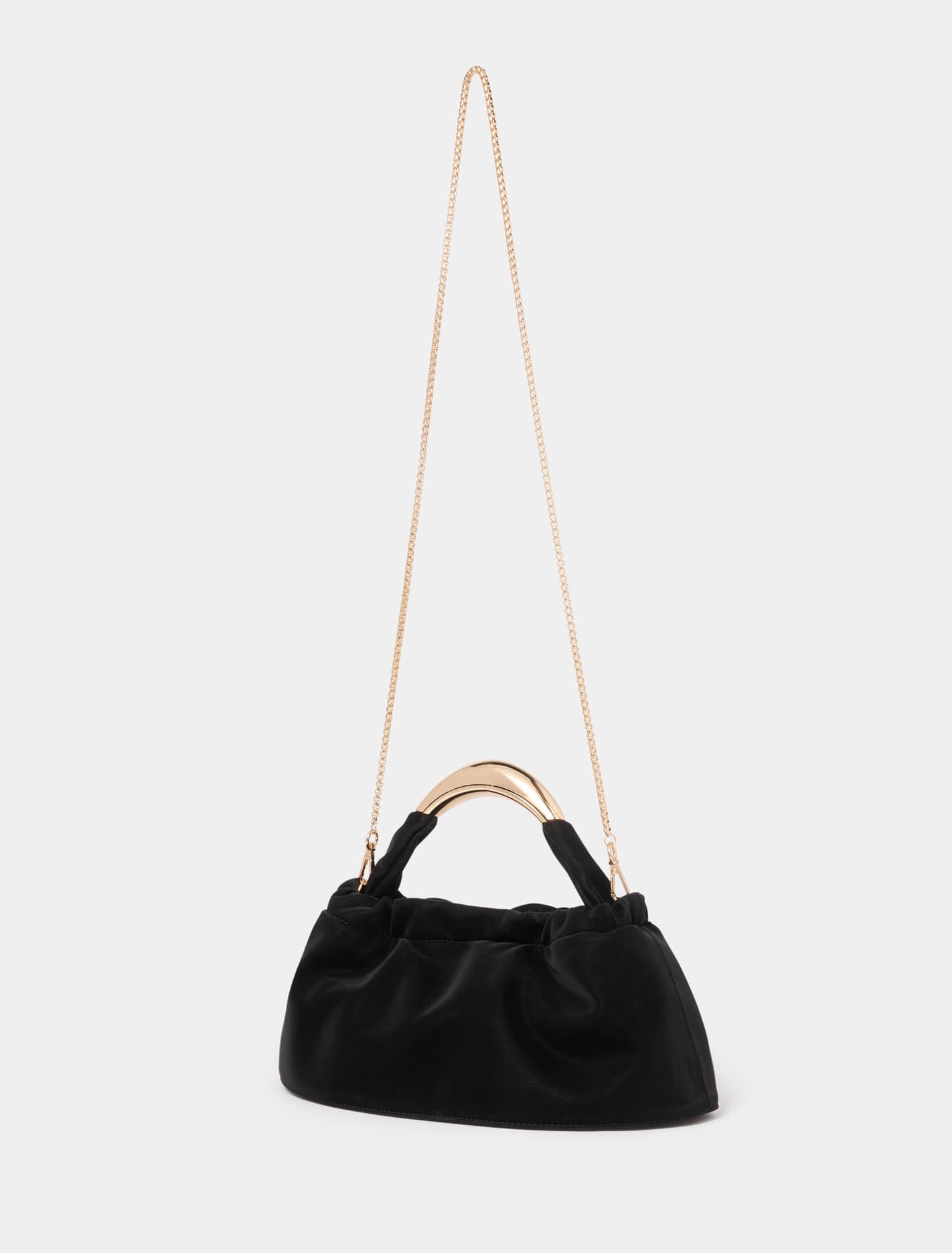 Signature Marigold Metal Handle Clutch Black_mannequin