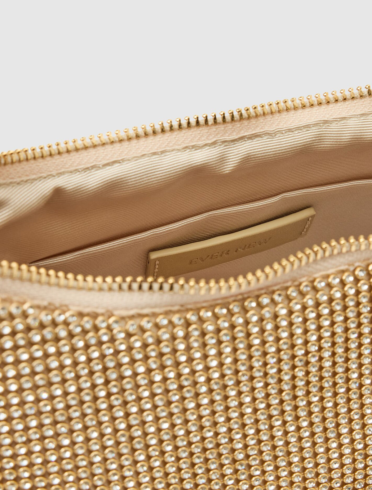 Paloma Curve Clutch Gold_mannequin