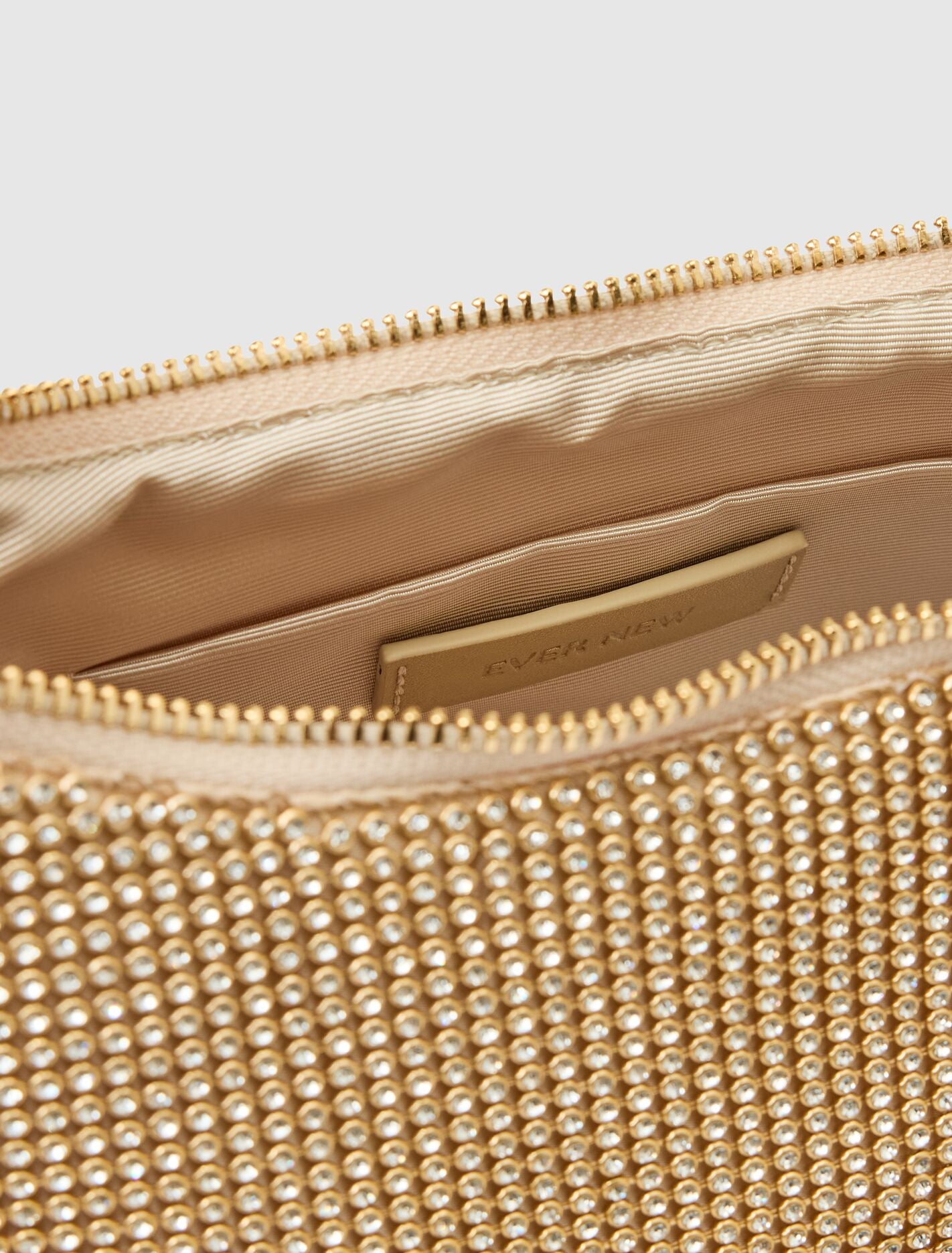 Paloma Curve Clutch Gold_mannequin